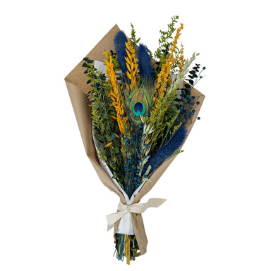 Colorful bouquet of dried flowers and peacock feather.