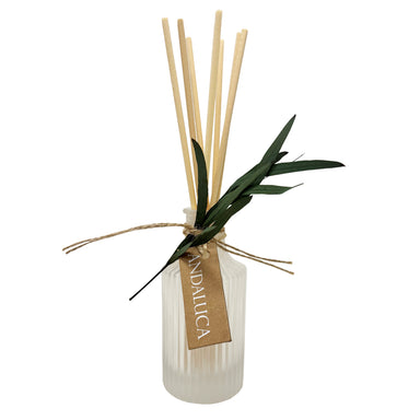 Frosted Ridge Diffuser glass with willow tied to bottle neck and reeds.