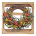 Floral artichoke half wreath in wood crate