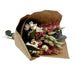 Mini bouquet with pinl larkspur, willow eucalyptus, baby eucalyptus, phalaris, and aveena in kraft paper wrap with jute tie.