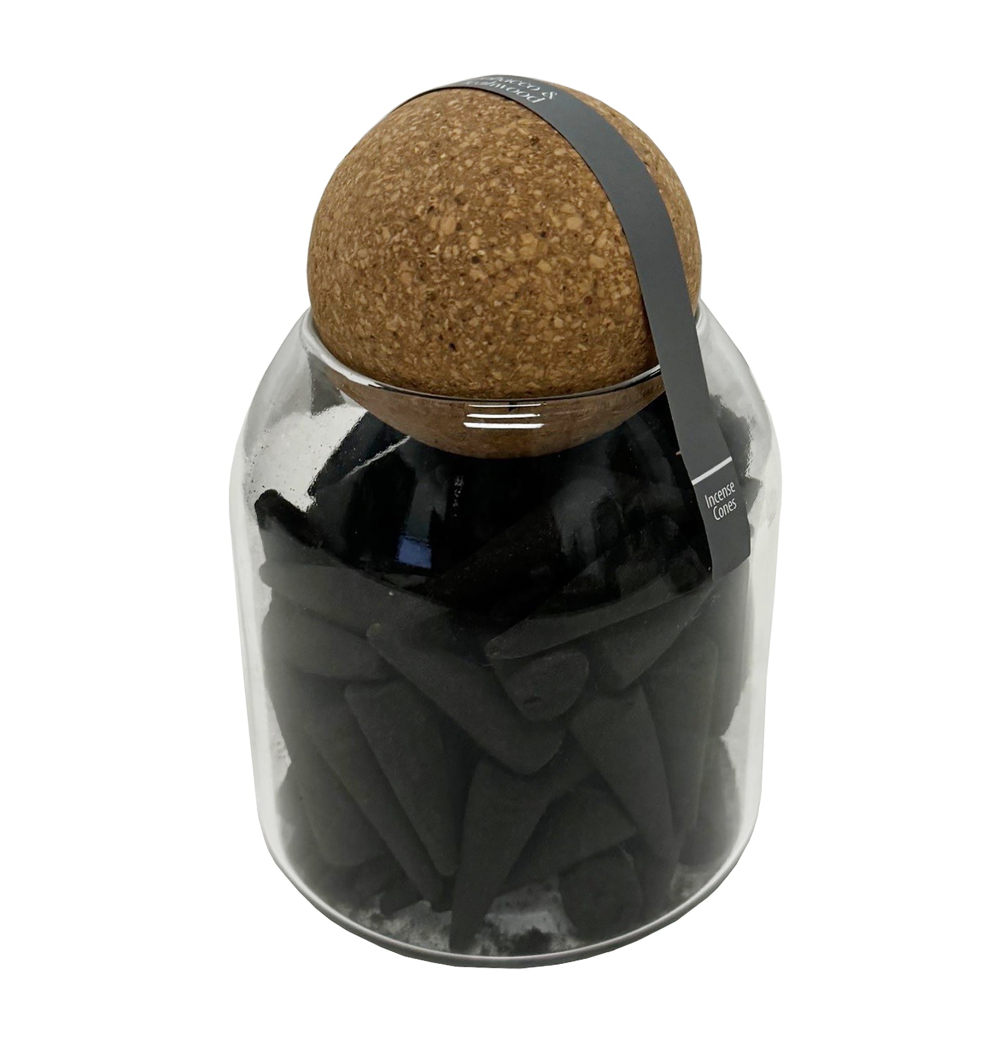 Black incense cones in glass jar with cork lid.