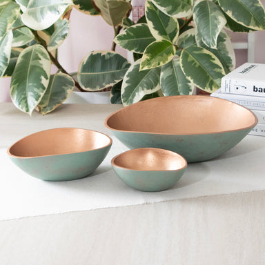 Set of 3 Turquoise Copper Cast Metal Decorative Bowls, empty bowls in room setting.