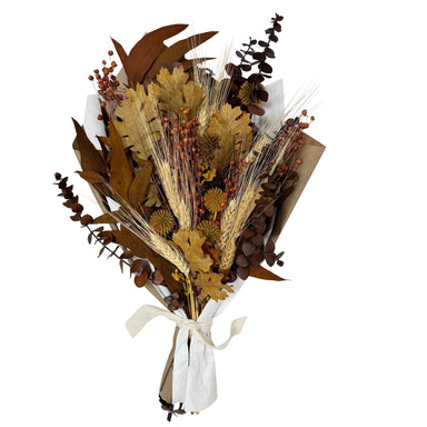 Harvest style bouquet in natural, brown, and golden orange.