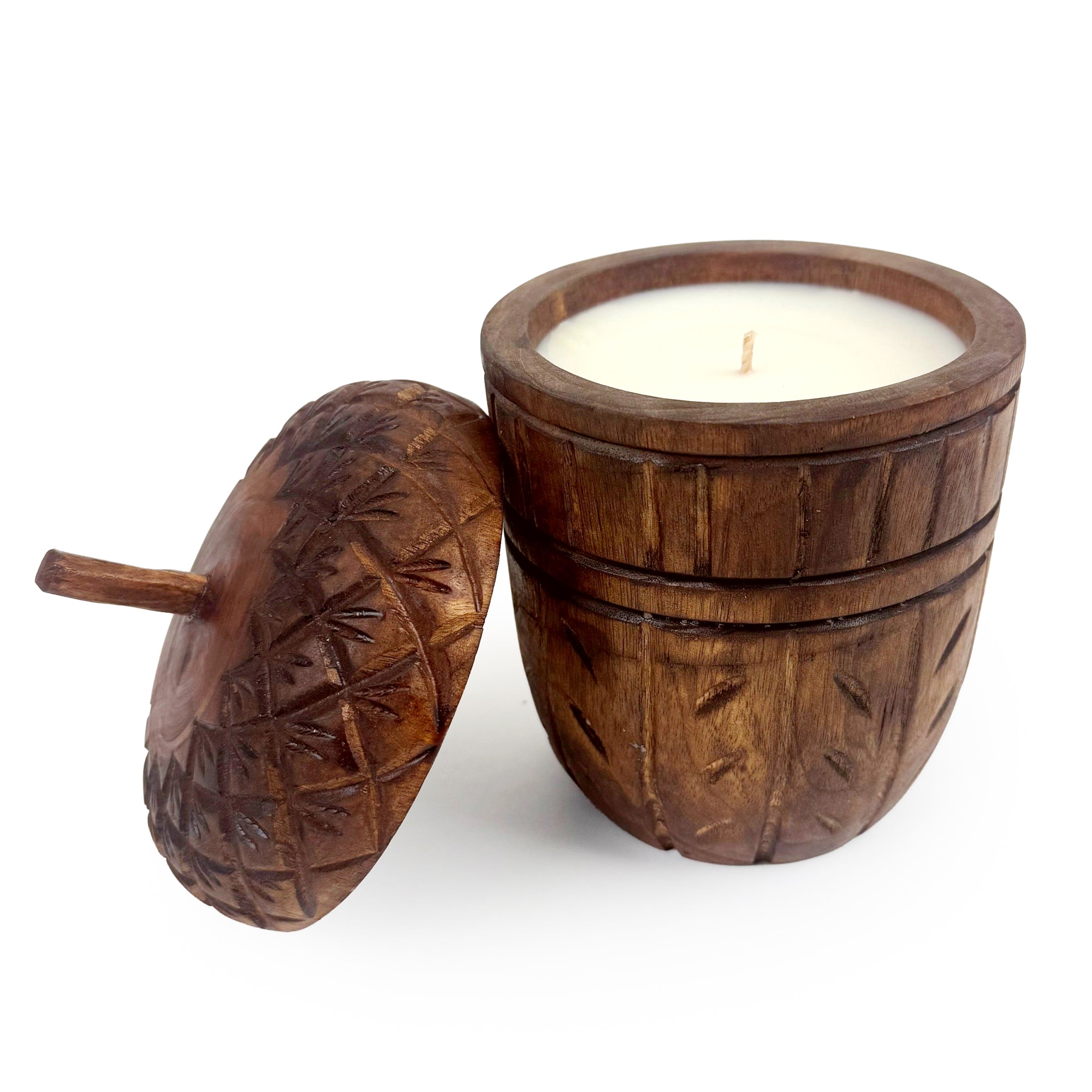 Carved Acorn Wood Candle vessel on a white background.