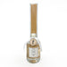 Glass reed diffuser with reeds attached to bottle and wood charm around bottle neck.