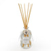 Reed diffuser with wooden sticks and a clear bottle labeled 'Lavender' on a white background