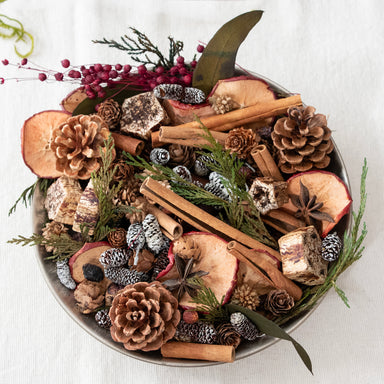 Over head view  of Apple Cinnamon Potpourri Bag displaced in a bowl.  For decoration only.
