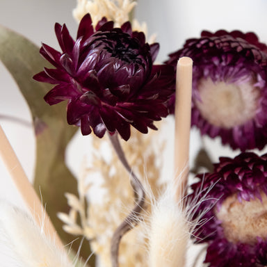 Close up of  dried floral bouquet, in a room setting.