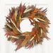 Burnt Orange Autumn Wreath, hanging on a white door.