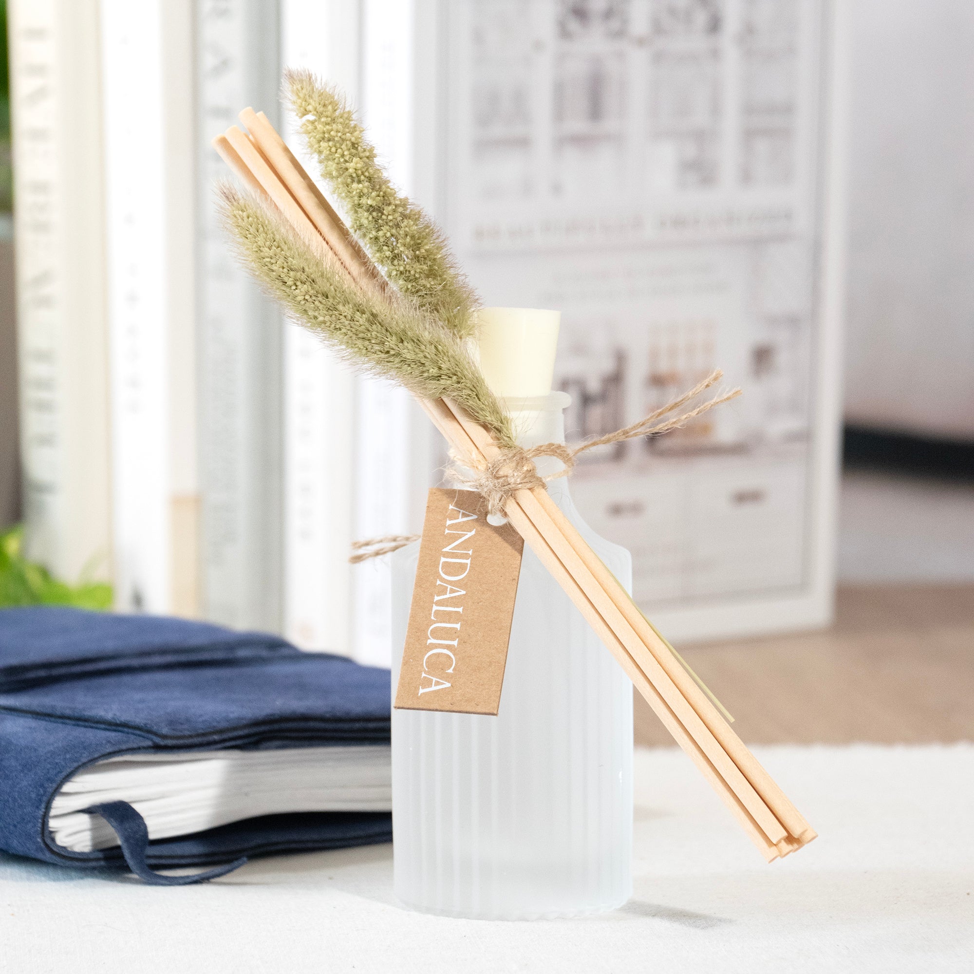 Cashmere Oak Frosted Ridge Glass Diffuser on a desk.