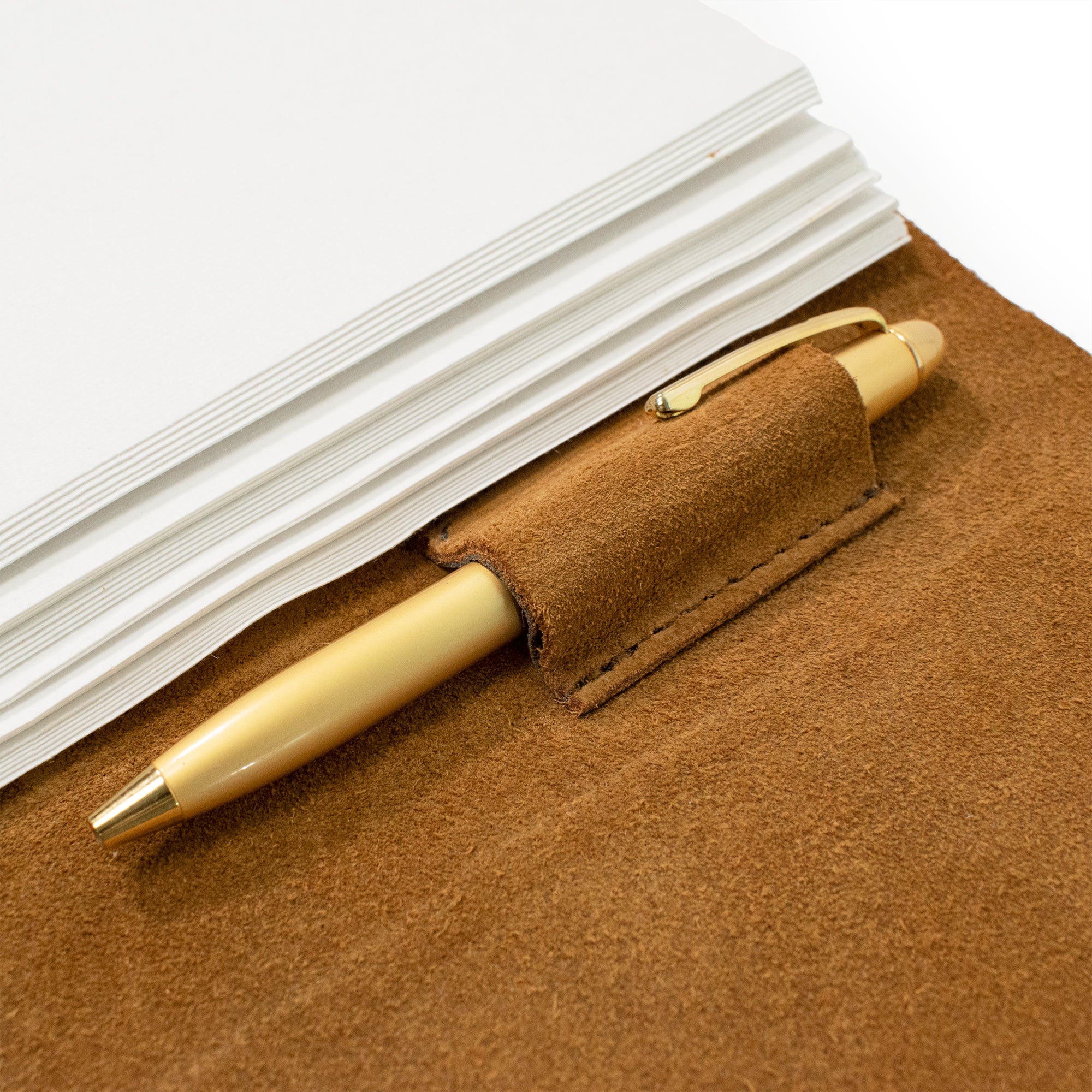 Detail shot of pen holder, for the Cognac color Large Suede Leather Journal w/ Organic Cotton Paper.