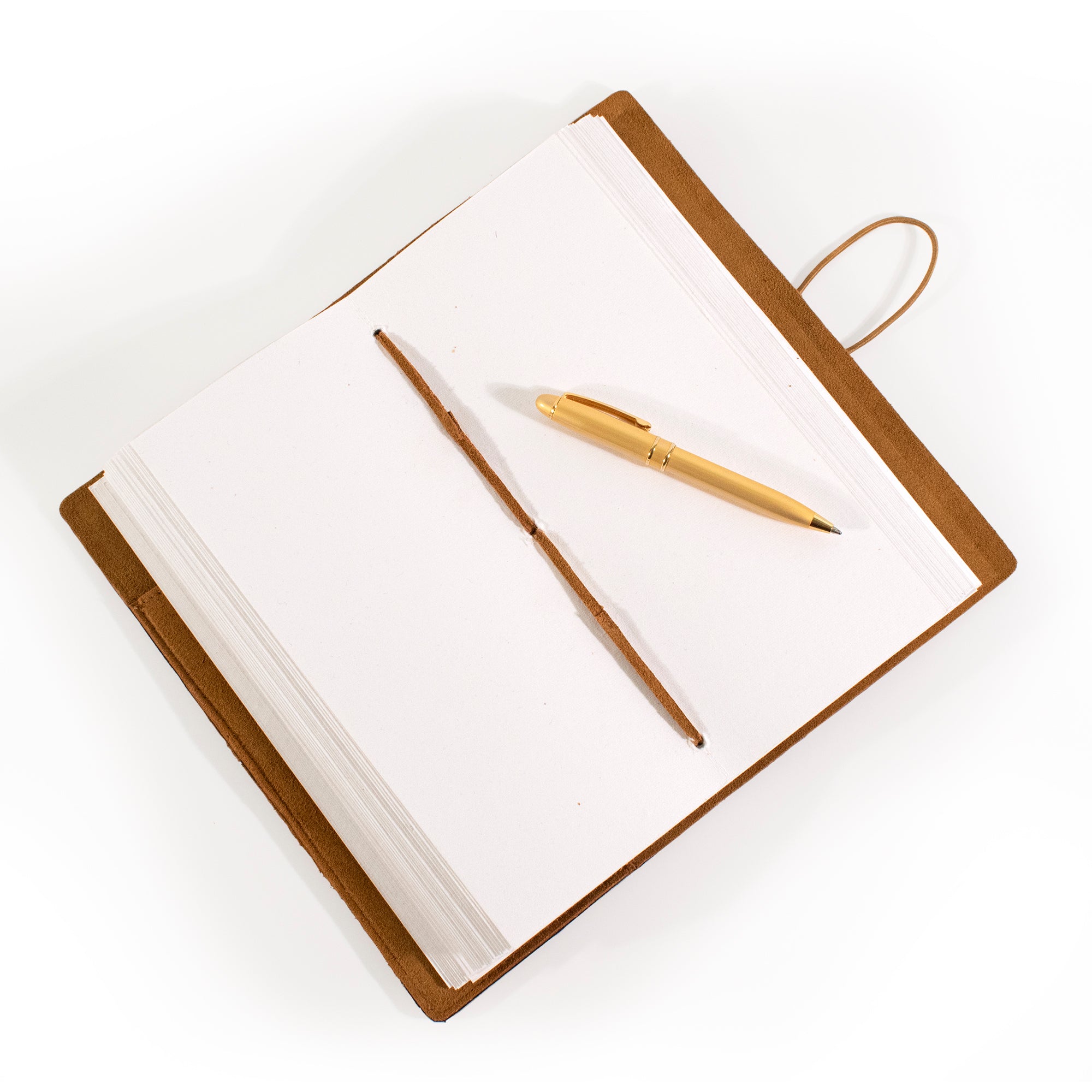 open, Cognac color small Suede Leather Journal w/ Organic Cotton Paper.
