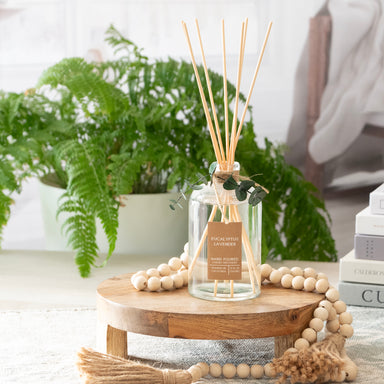 In use, Eucalyptus Lavender Botanical Tie Reed Diffuser, in room setting.