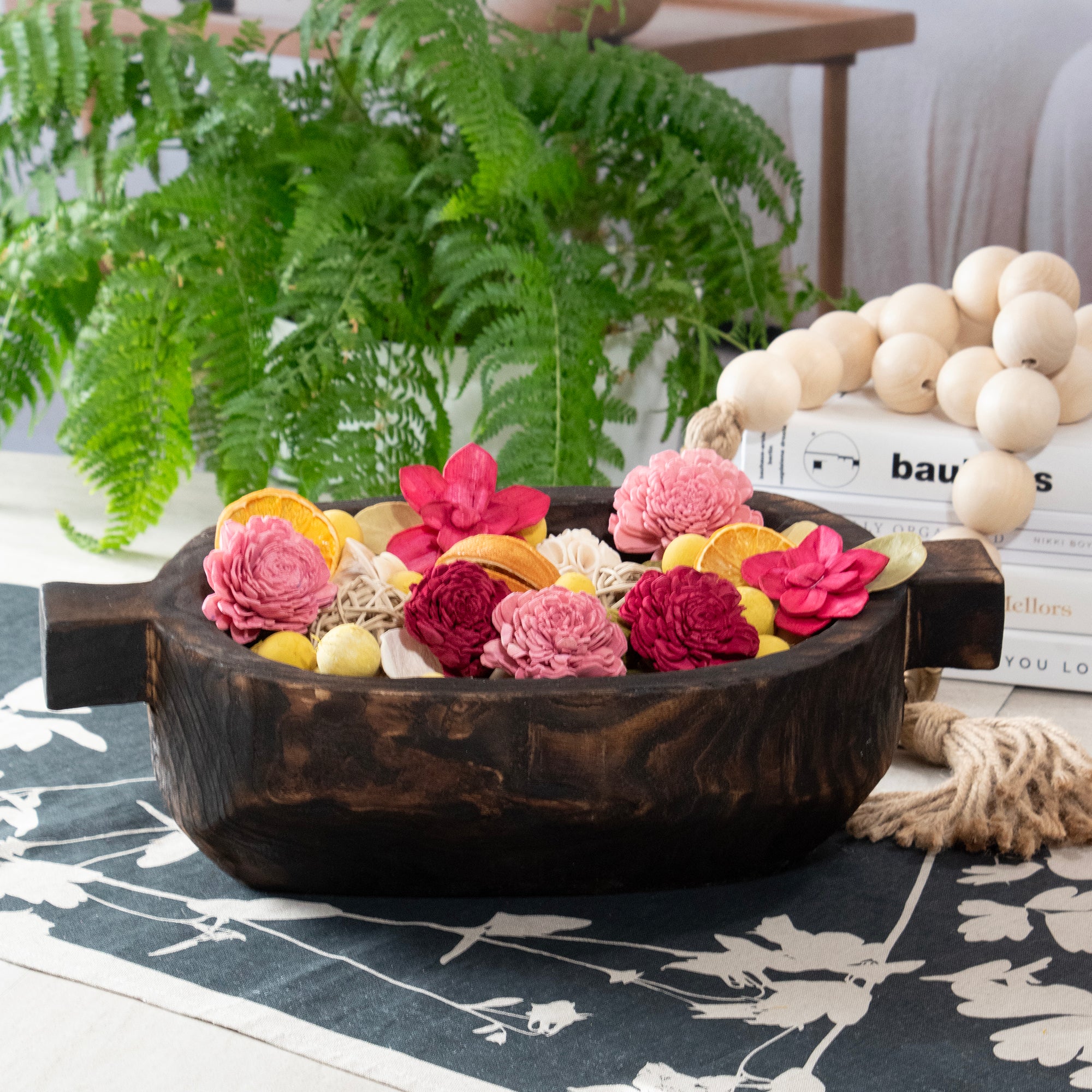  Forbidden Flower Oasis Potpourri, displayed in a wood bowl, in a room setting.