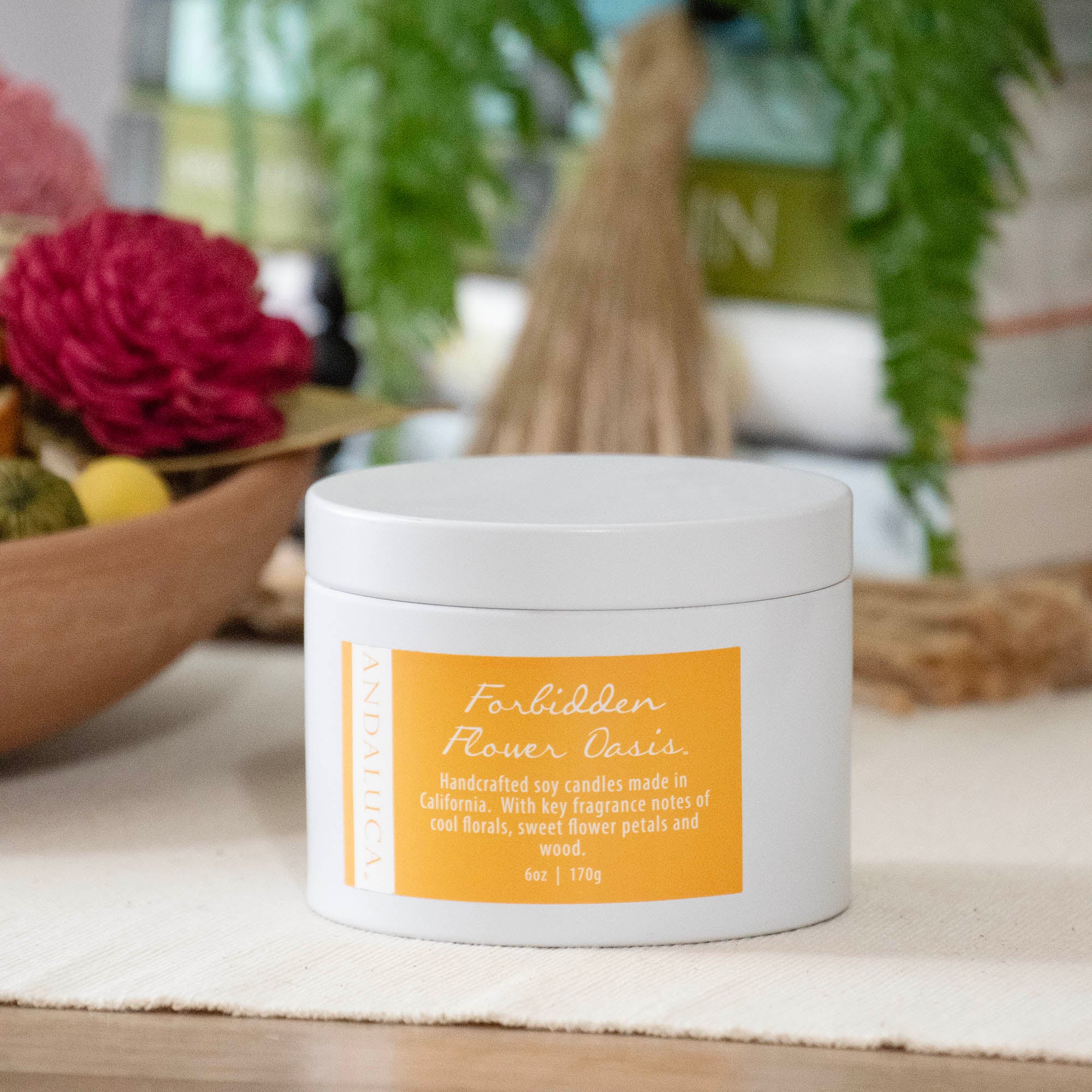 Forbidden Flower Oasis Tin Candle, closed.