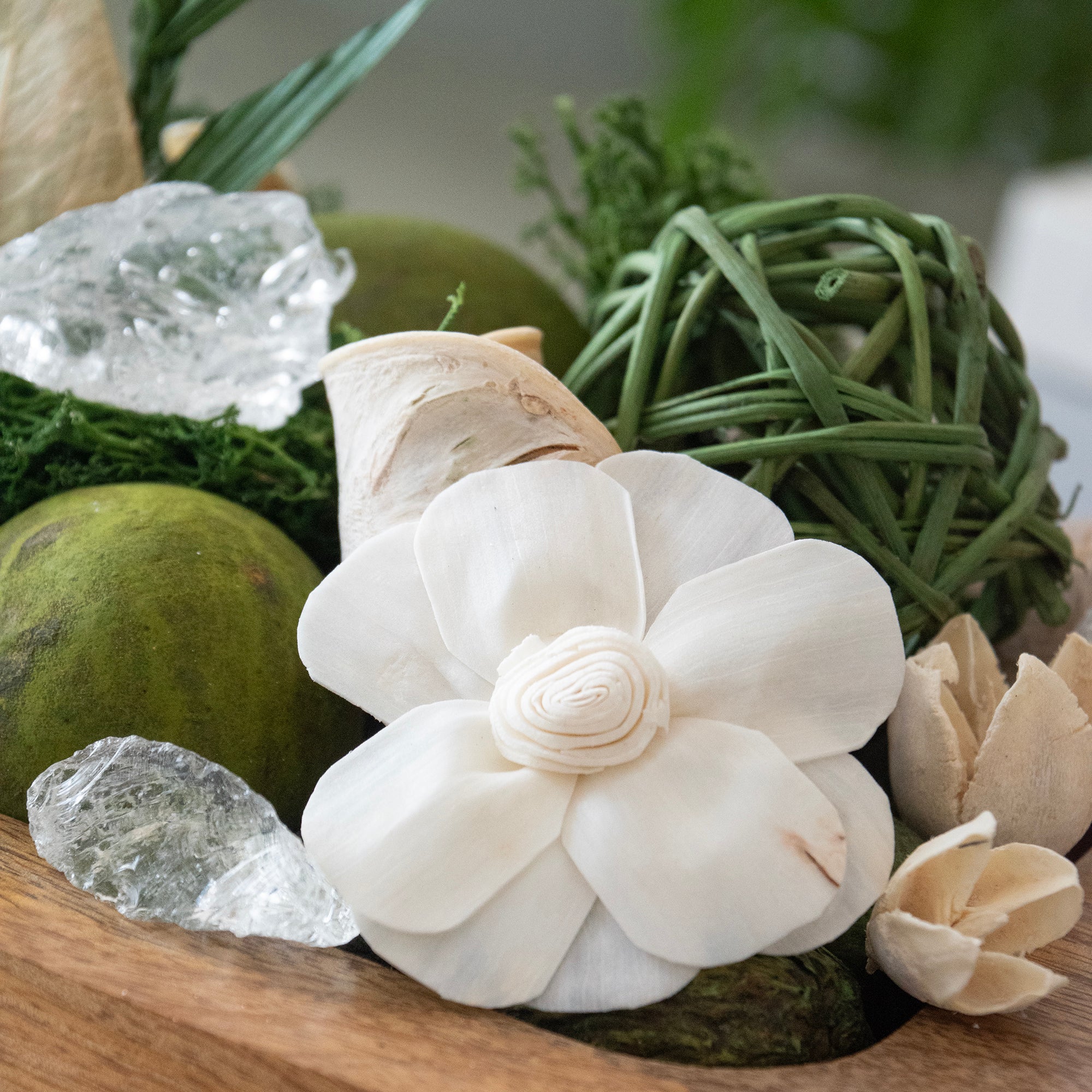 Close -up of Gardens of Bali Potpourri in a wood bowl.