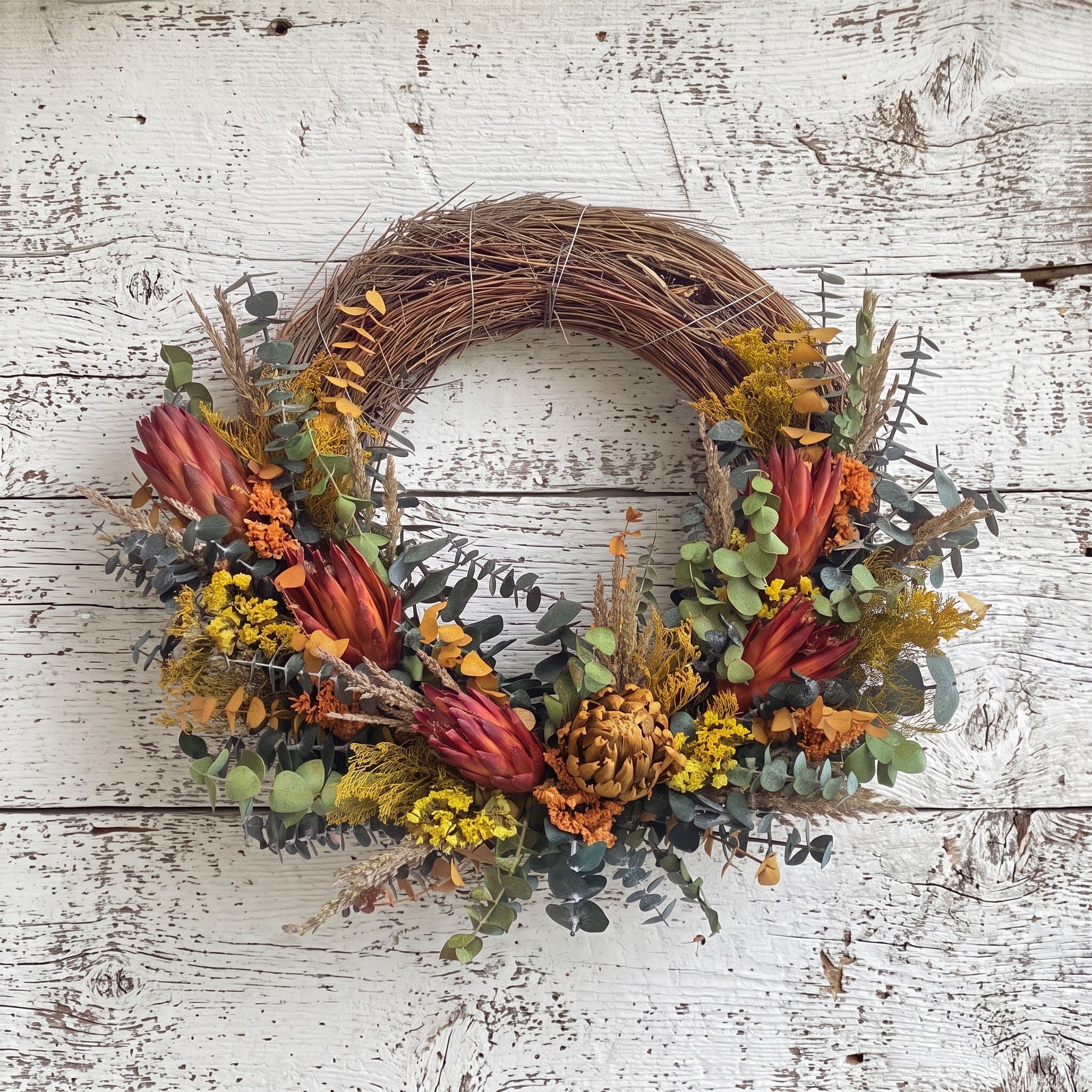 Floral artichoke half wreath.
