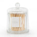 Glass jar with lid and white matches.