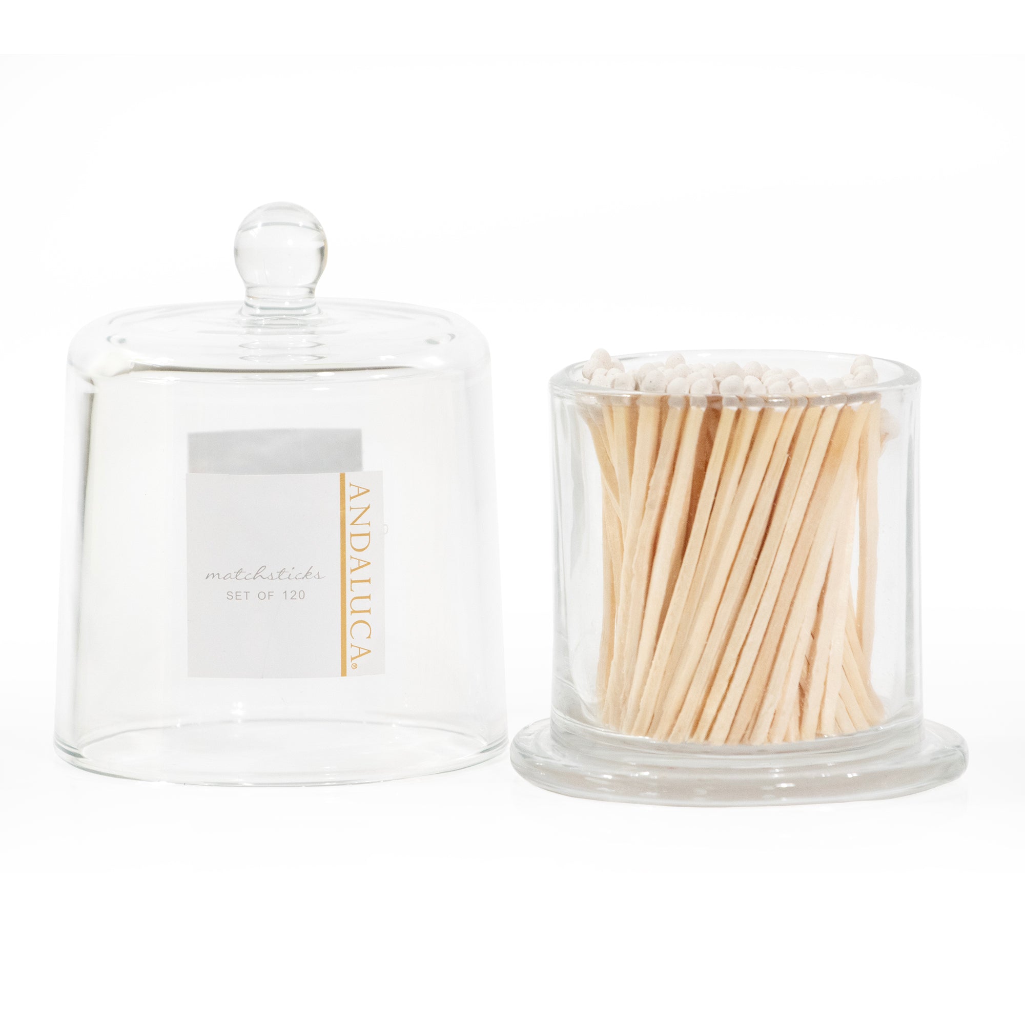 Glass jar with lid and white matches.