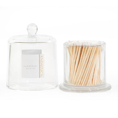 Glass jar with lid and white matches.