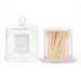 Glass jar with lid and white matches.