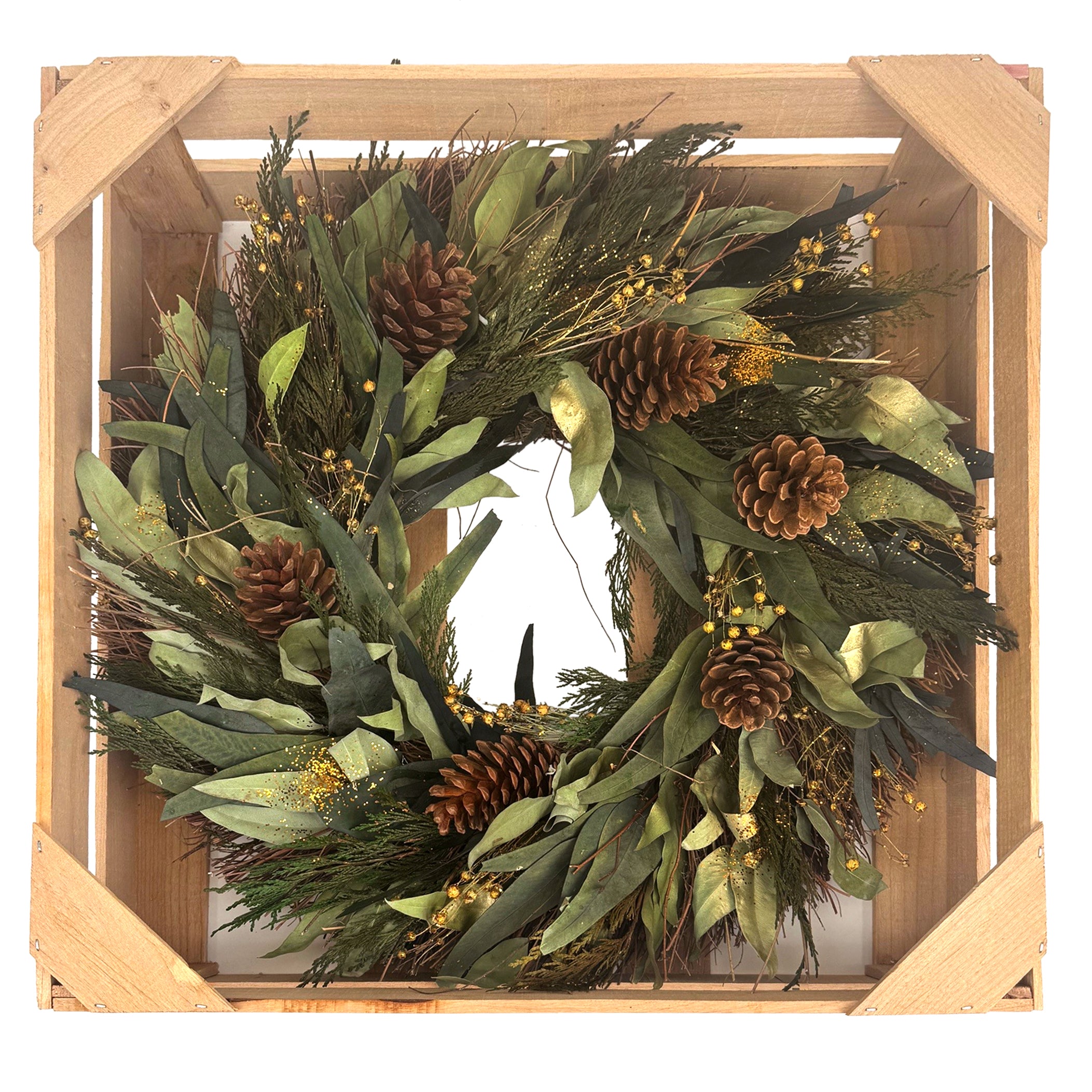 Lush natural wreath with leaves and pinecones.