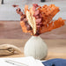 Harvest Oak Leaf Mini Bouquet, displayed in a vase on a table top.