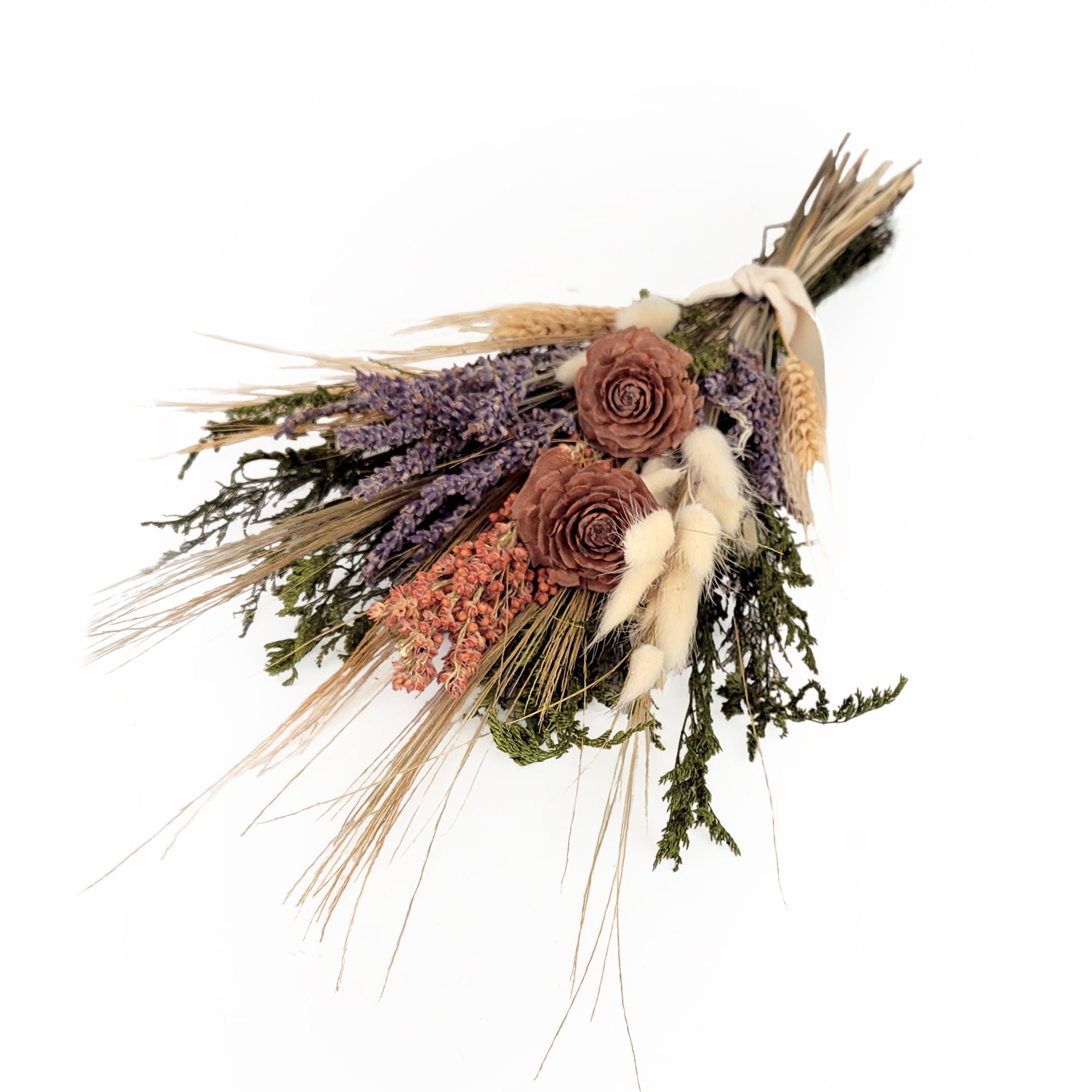 Rustic dried flower bouquet with lavender and other grains.