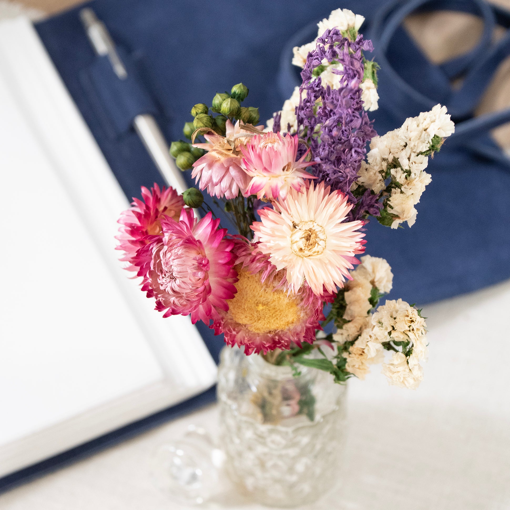 Mini Strawflower & Larkspur Bouquet Bundle, overhead image of the bouquet in a vase.