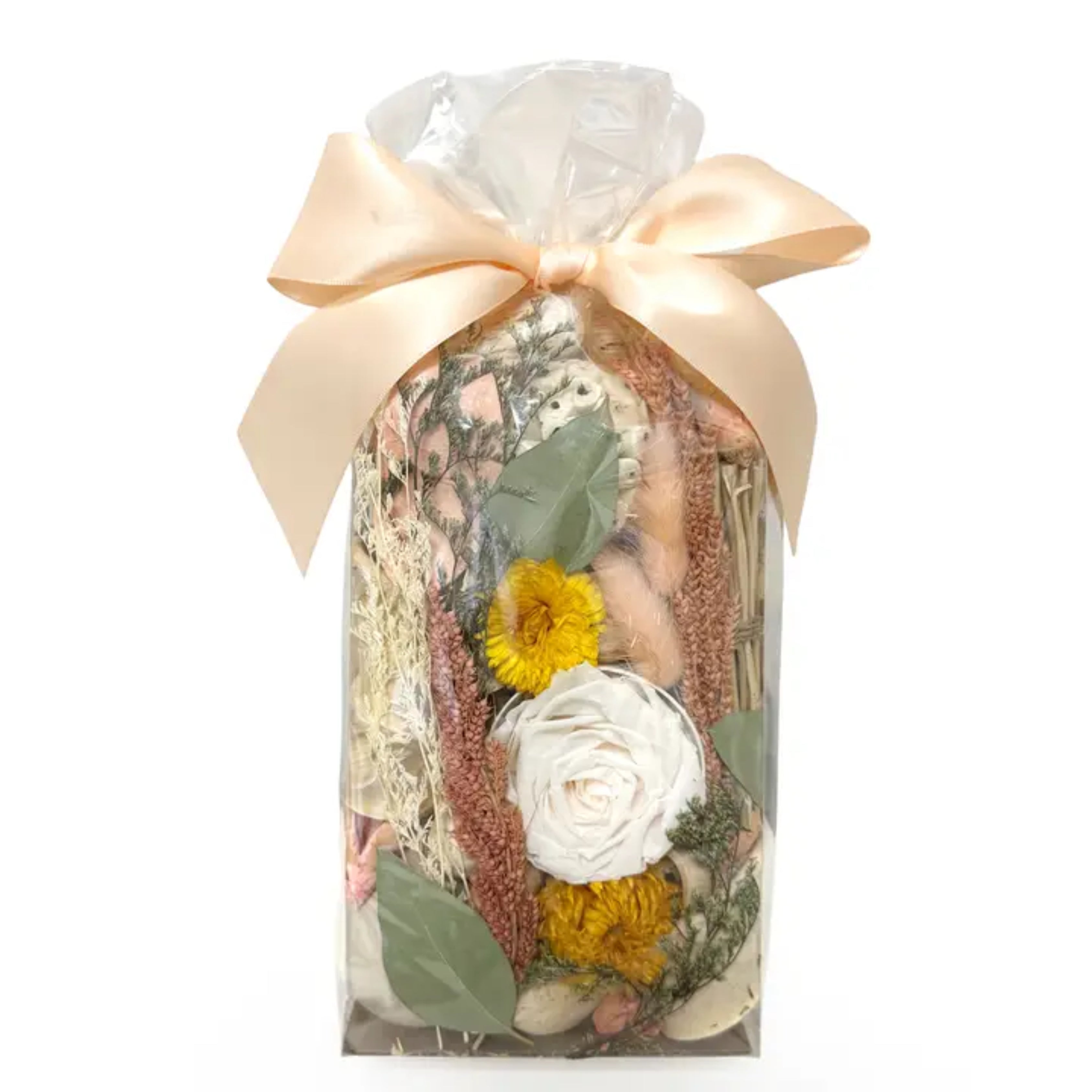 Jar filled with dried flowers and plants, tied with a bow on a white background