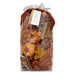 Packaged fall-themed potpourri with cinnamon sticks and autumn leaves on a white background