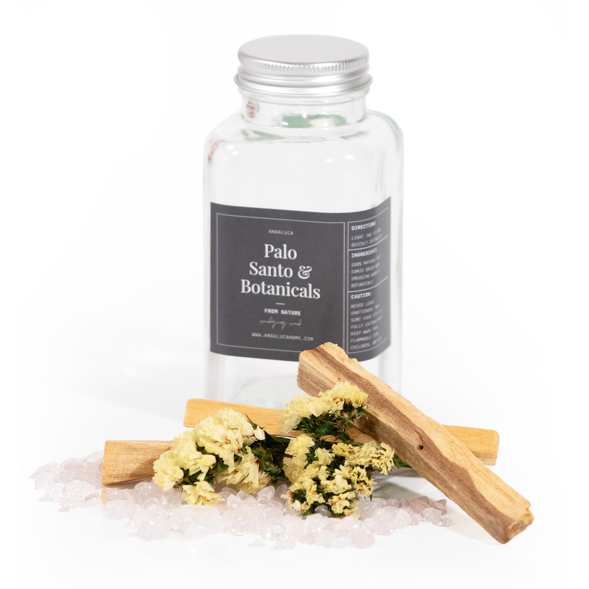 Contents of the Palo Santo & Yellow Flower Smudging Jar Set, displayed in front of the empty jar.