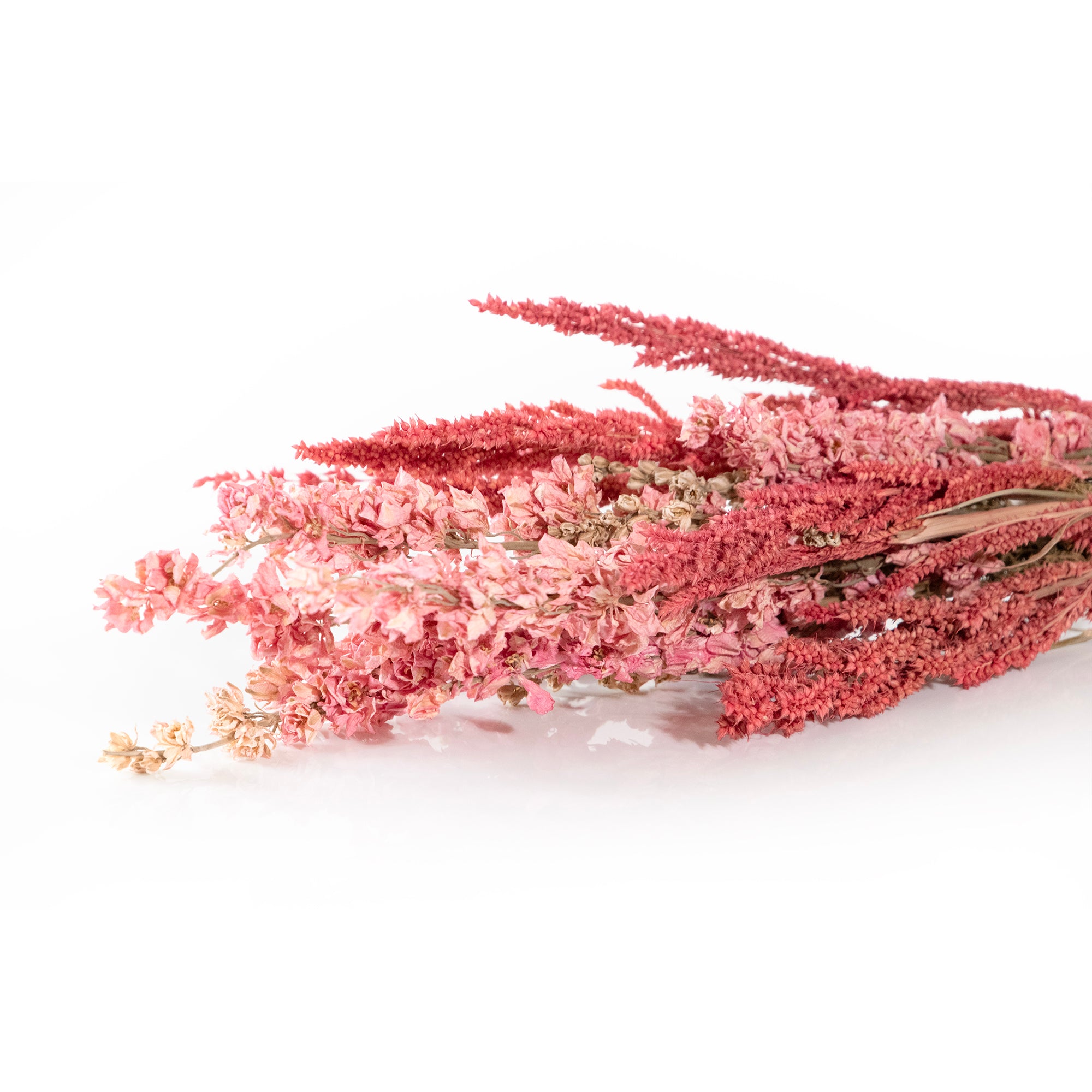 Pink floral bouquet with grains.