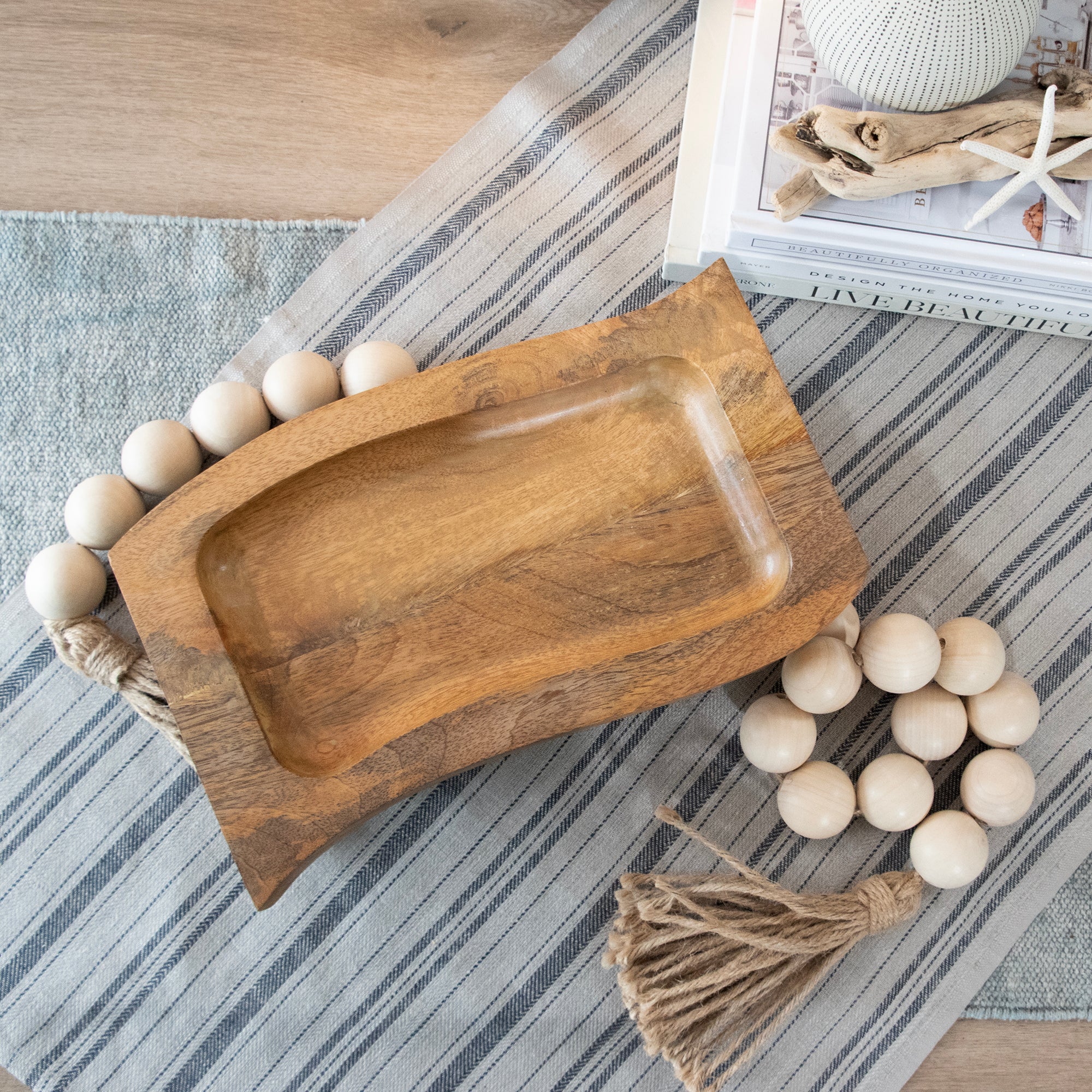 Overhead view of Raised Rectangular Charcuterie Board in a room setting.