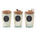 All three candle fragrance shown together. They are candles poured in a recycled glass vessel with thick cork cap, tied with a raffia tie and botanical sprig. 