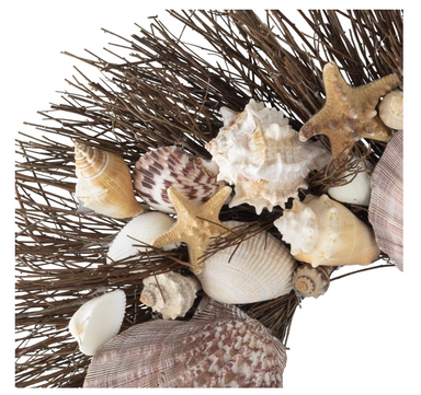 Wreath made from brown starfish, clamshells, and white conch shells on brown twig wreath base.