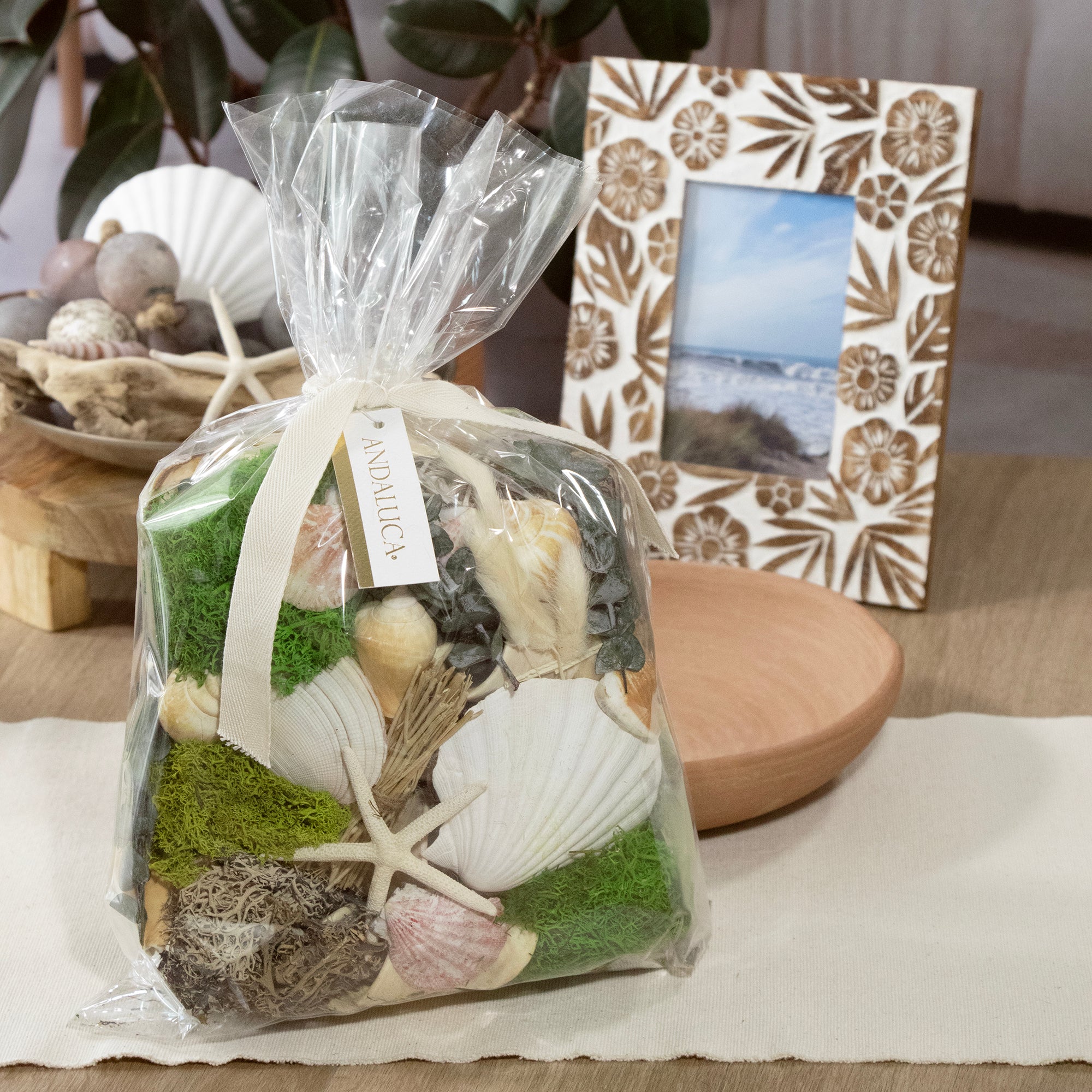 Seashell Medley & Moss Bowl Filler bag displayed on a table.