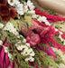 Vibrant pink dried flower bouquet.