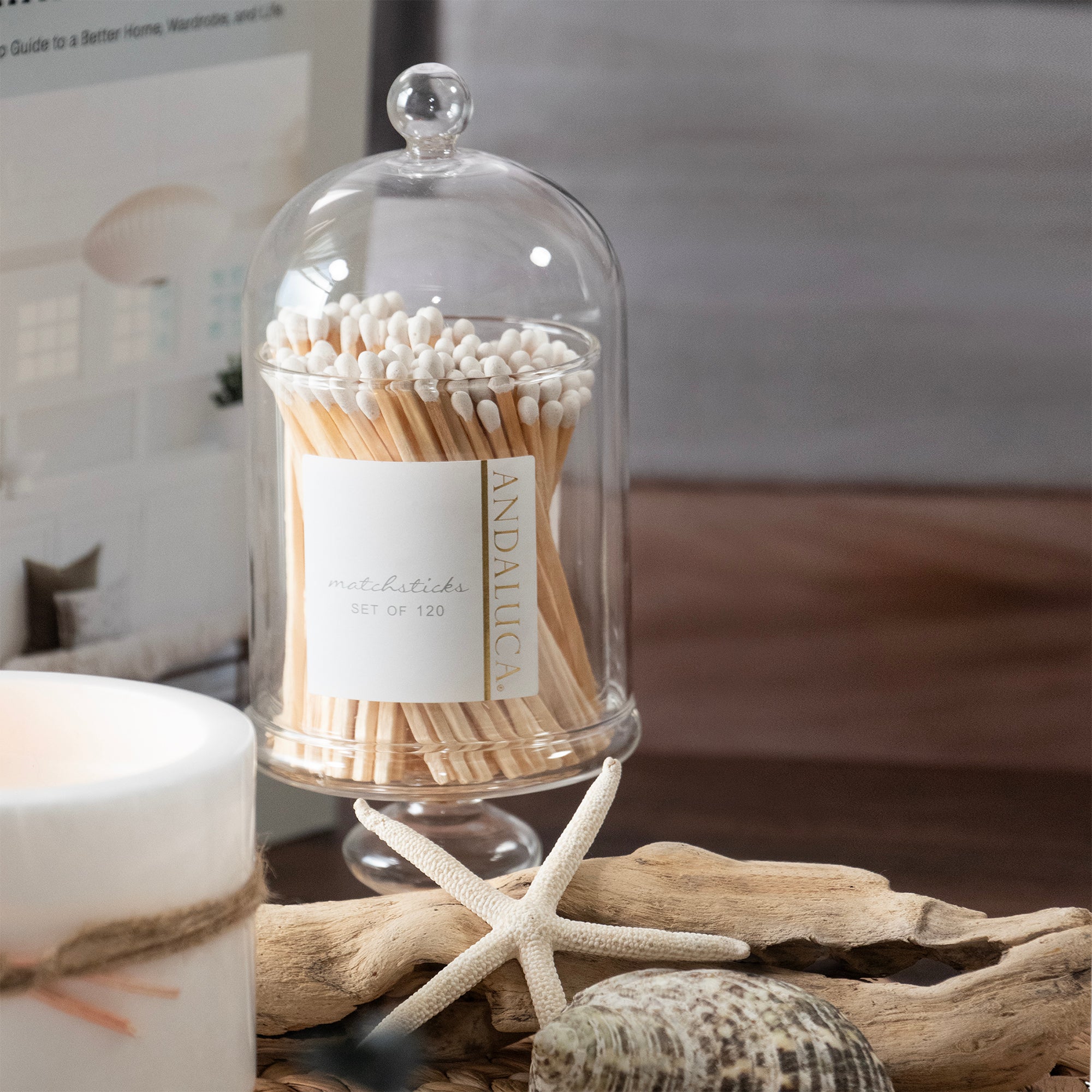 Tall glass jar with Lid,  120ct. wooden white matches. Displayed on a table setting.