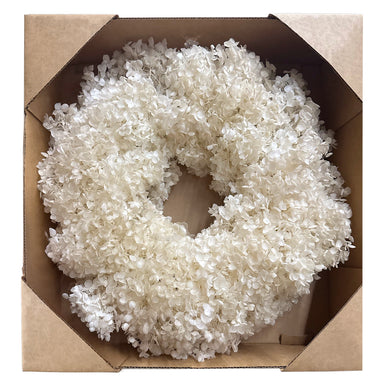 An 18" of Natural White Hydrangea Preserved  Wreath. Showen in a cardbord display box.