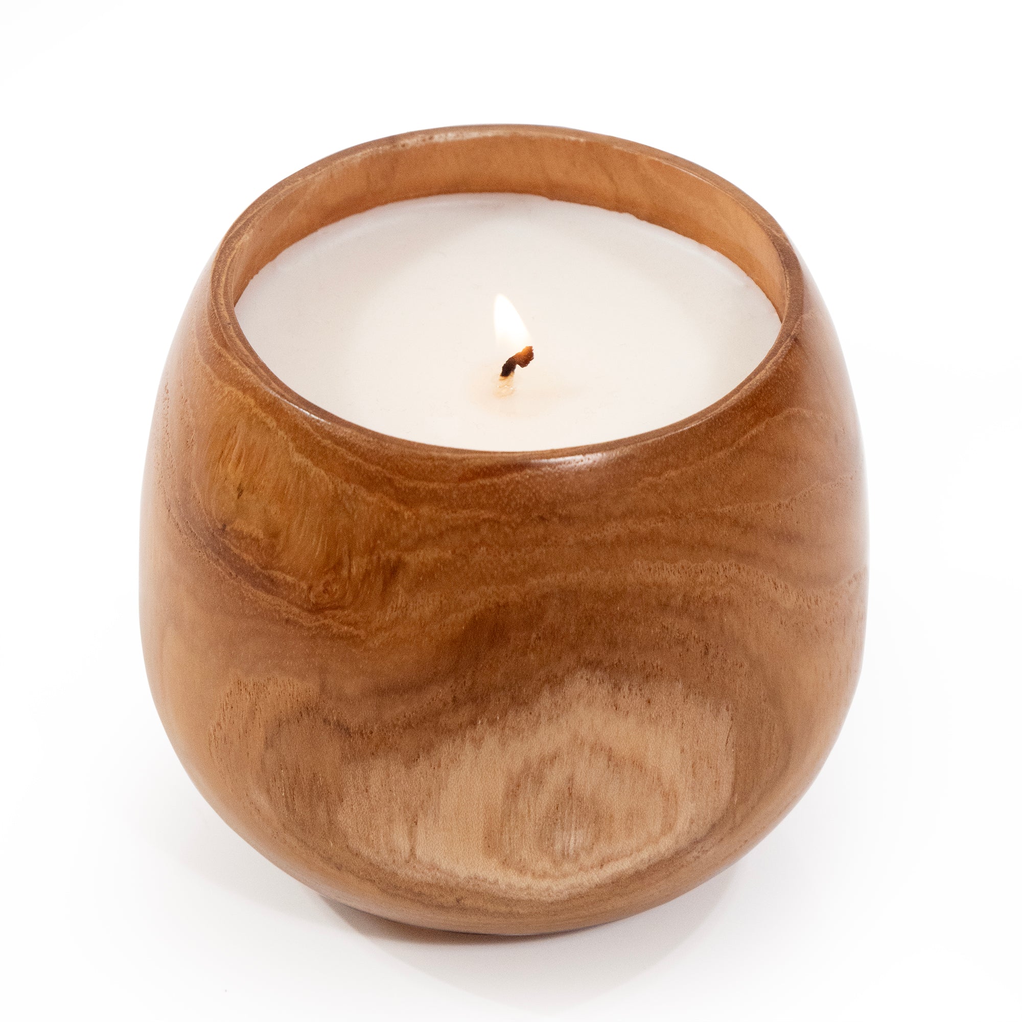 Candle filled into wood cup.