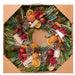 Pomegranate Citrus Wreath in packaging